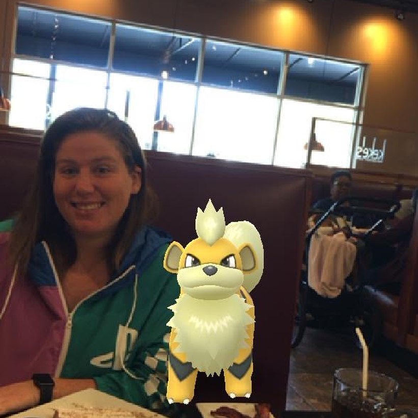 Bry with a shiny Growlithe caught in Pokémon GO